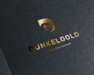 dunkelgold_beitragsbild Logo gedruckt in gold-schwarz